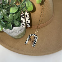 
              Cow Arch Necklace
            